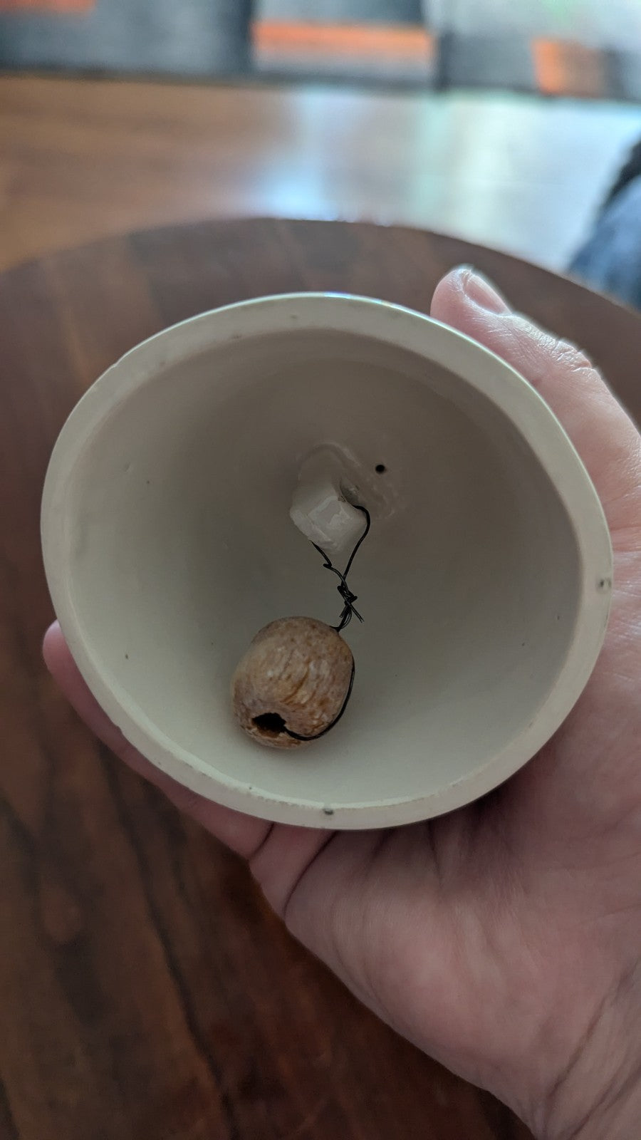 white Vintage Bell with Orange Roses | Crystal Arborist