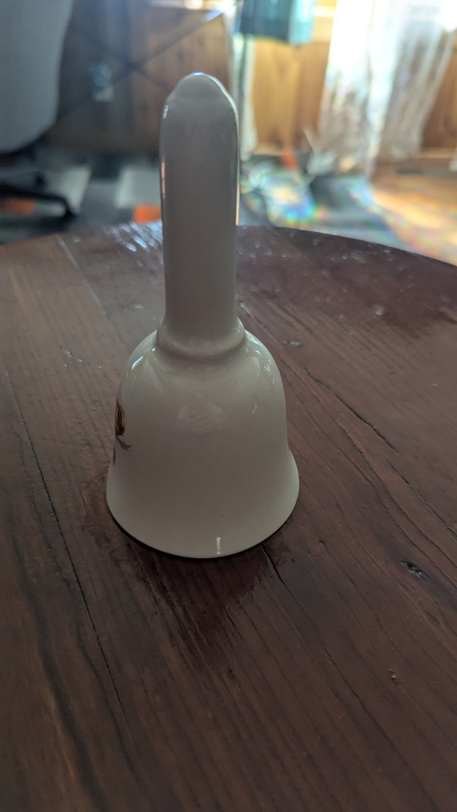 white Vintage Bell with Orange Roses | Crystal Arborist