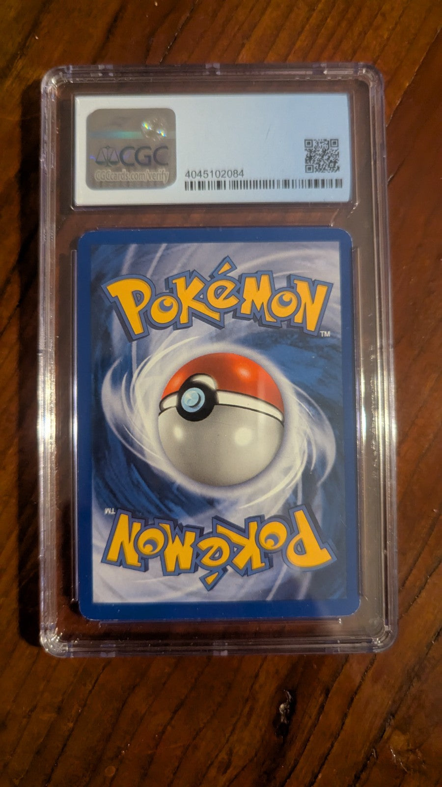 Pokemon CGC 7.5 Near Mint + 1999 Ninetales Base Set Holo 12/102