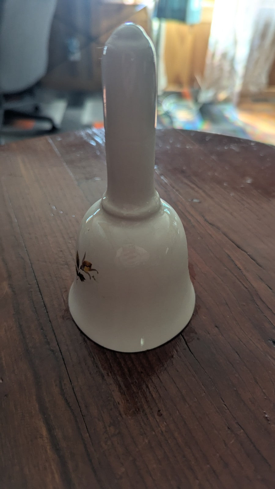 white Vintage Bell with Orange Roses | Crystal Arborist